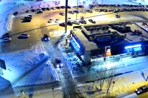 Estacionamento no centro comercial cidade. Webcams Severodvinsk